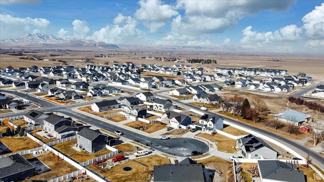 bird's eye view featuring a mountain view and a residential view