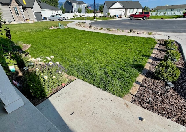 view of yard featuring a residential view