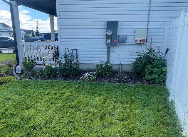 view of home's exterior featuring a yard