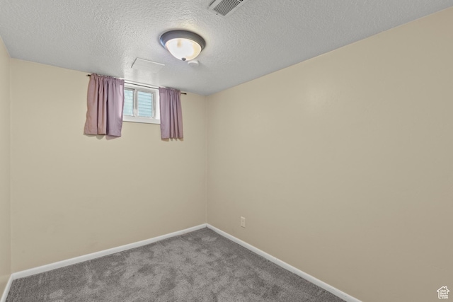 385 N 400 E, Logan, UT 84321 - carpeted empty room featuring baseboards and a textured ceiling