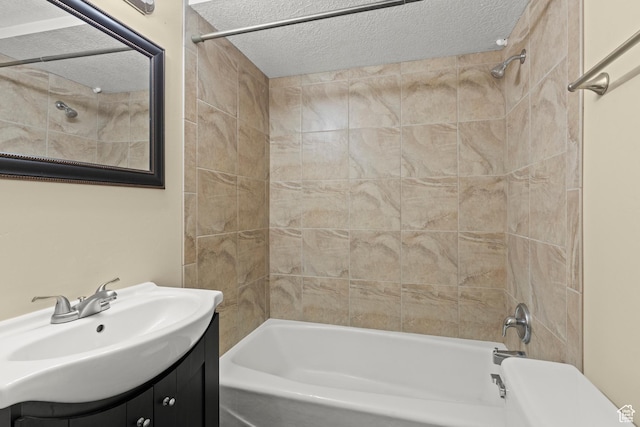 385 N 400 E, Logan, UT 84321 - full bathroom featuring  shower combination, vanity, a textured ceiling, and toilet
