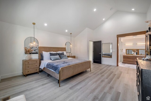 1489 E Spring Ln S, Holladay, UT 84117 - bedroom featuring light hardwood / wood-style flooring and high vaulted ceiling
