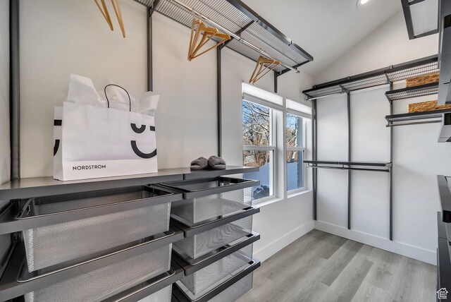 1489 E Spring Ln S, Holladay, UT 84117 - walk in closet featuring lofted ceiling and light hardwood / wood-style floors