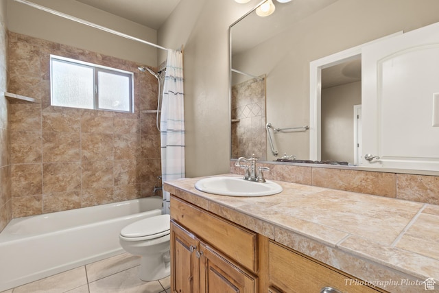 full bathroom featuring tile patterned flooring, vanity, shower / bath combo, and toilet