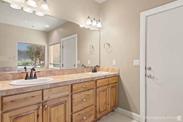 bathroom featuring vanity and tile patterned flooring