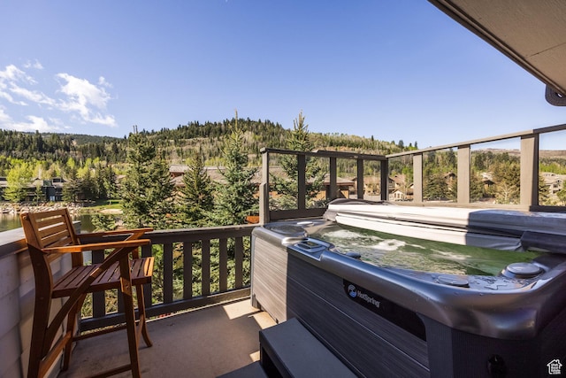 1428 N Deer Valley Dr, Park City, UT 84060 - view of patio with a forest view and a hot tub