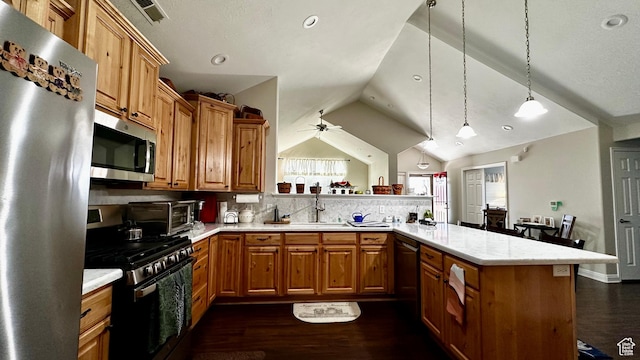 929 W 1920 S Unit A, Syracuse, UT 84075 - kitchen featuring pendant lighting, backsplash, stainless steel appliances, vaulted ceiling, and kitchen peninsula