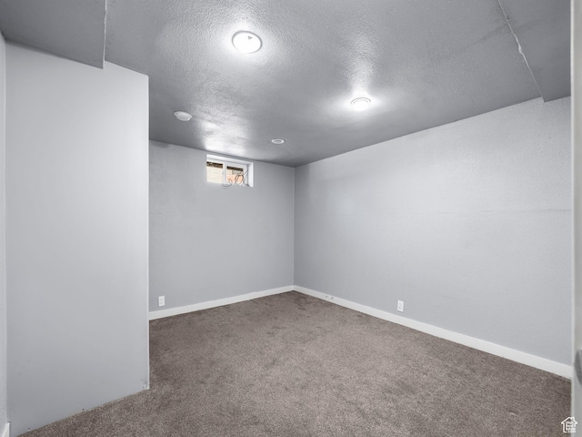 320 W Washington Ave S, American Fork, UT 84003 - basement featuring a textured ceiling and dark carpet