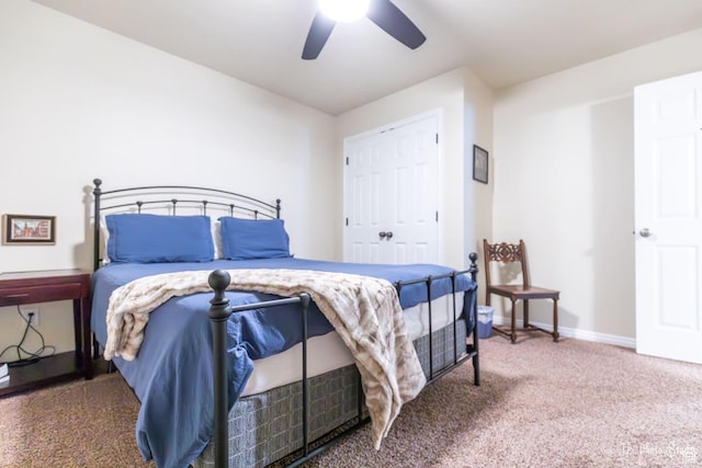 bedroom featuring carpet, ceiling fan, and a closet