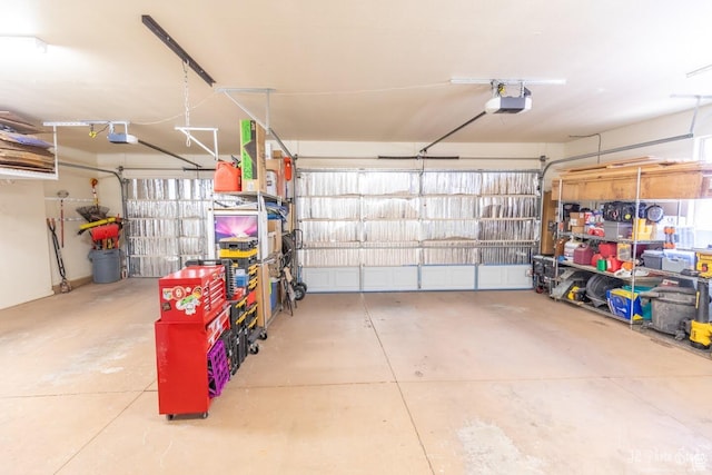 garage featuring a garage door opener