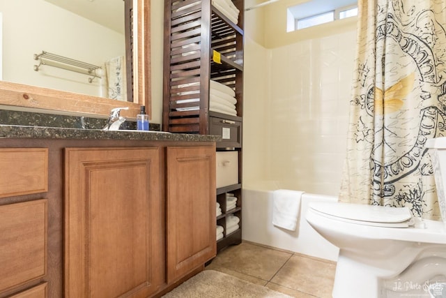 full bathroom featuring shower / tub combo, vanity, tile patterned flooring, and toilet