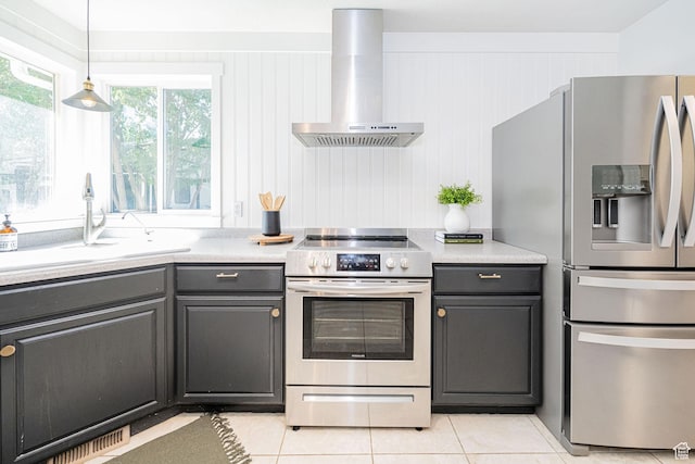 12138 S Willmar Cir, Riverton, UT 84065 - kitchen featuring appliances with stainless steel finishes, wall chimney range hood, gray cabinets, light tile patterned floors, and light countertops