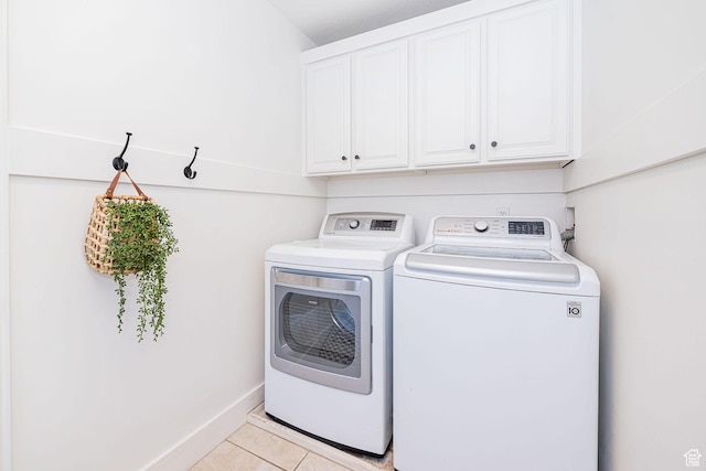 12138 S Willmar Cir, Riverton, UT 84065 - laundry room with washing machine and clothes dryer, cabinet space, and light tile patterned flooring
