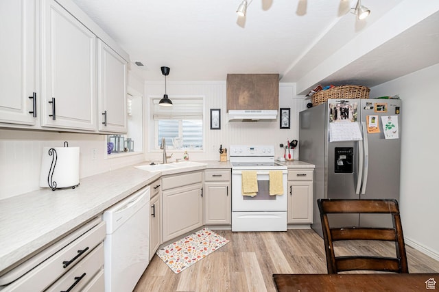 12138 S Willmar Cir, Riverton, UT 84065 - kitchen featuring white appliances, range hood, light wood-style flooring, and light countertops
