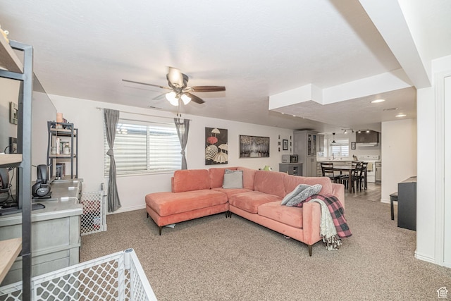 12138 S Willmar Cir, Riverton, UT 84065 - carpeted living area with a ceiling fan and baseboards