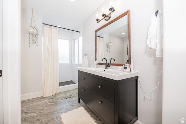 12138 S Willmar Cir, Riverton, UT 84065 - full bath featuring marble tiled flooring, vanity, and a shower with shower curtain