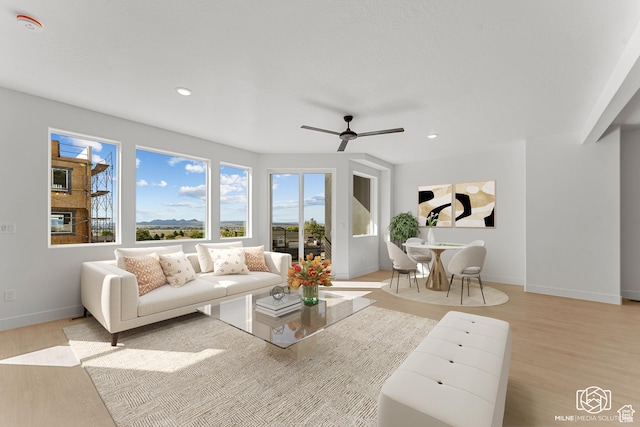 665 E 2015 N Unit 5C, Cedar City, UT 84721 - living room with light hardwood / wood-style flooring and ceiling fan
