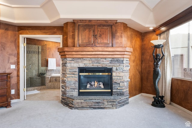 carpeted living room featuring a fireplace