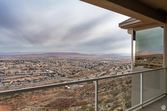 balcony featuring a mountain view