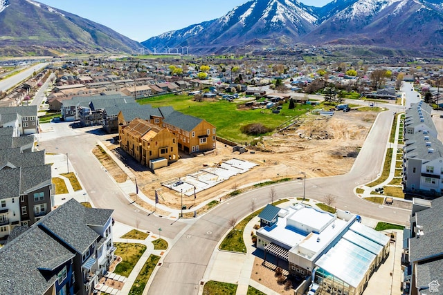 birds eye view of property featuring a mountain view