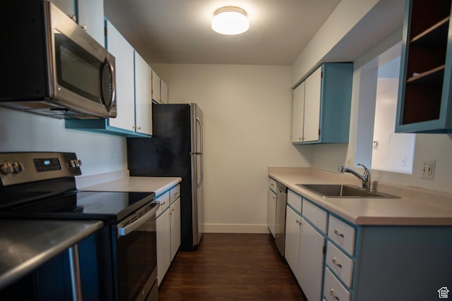 4188 S Oak Meadows Dr W Unit 21, Taylorsville, UT 84123 - kitchen with white cabinetry, sink, dark hardwood / wood-style flooring, and appliances with stainless steel finishes