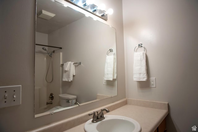 4188 S Oak Meadows Dr W Unit 21, Taylorsville, UT 84123 - full bathroom with vanity, washtub / shower combination, and toilet