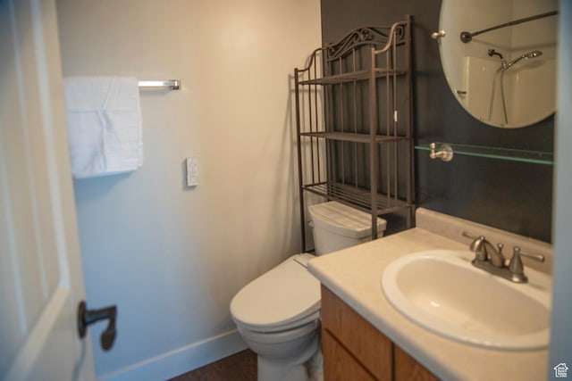 4188 S Oak Meadows Dr W Unit 21, Taylorsville, UT 84123 - bathroom featuring a shower, vanity, and toilet