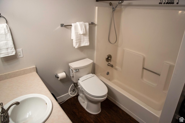 4188 S Oak Meadows Dr W Unit 21, Taylorsville, UT 84123 - full bathroom featuring shower / bathtub combination, wood-type flooring, toilet, and vanity