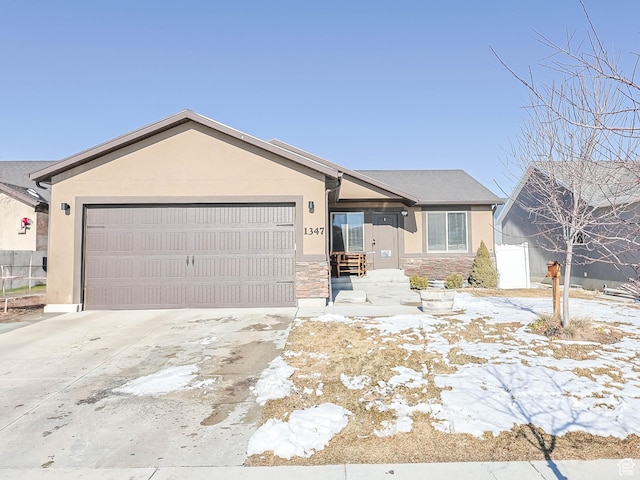 ranch-style home with a garage