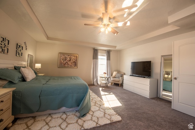 324 S Hayes Well Ln, Saratoga Springs, UT 84045 - bedroom with carpet flooring, a tray ceiling, and a ceiling fan