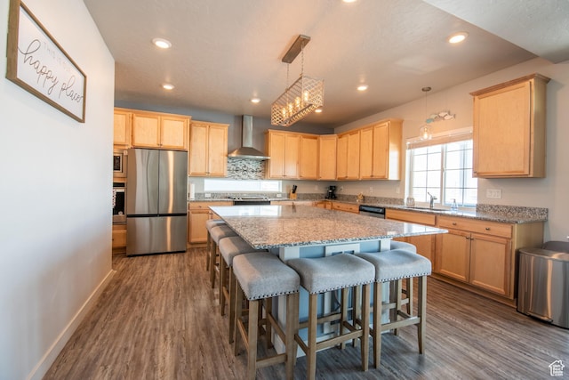 324 S Hayes Well Ln, Saratoga Springs, UT 84045 - kitchen featuring wall chimney exhaust hood, stainless steel appliances, light brown cabinetry, and dark wood finished floors