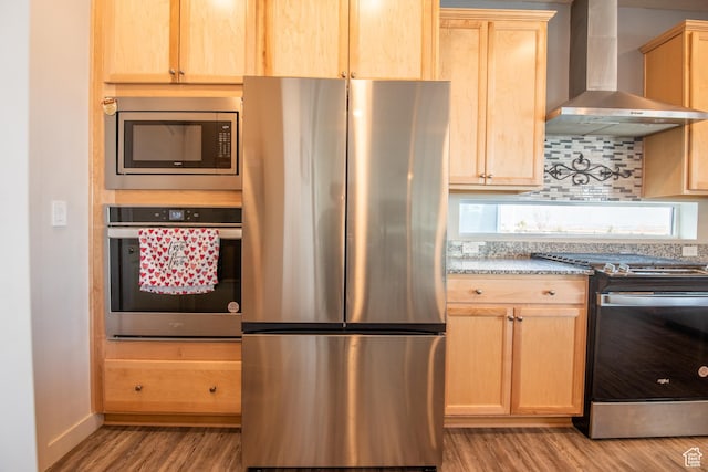 324 S Hayes Well Ln, Saratoga Springs, UT 84045 - kitchen featuring light brown cabinets, stainless steel appliances, wall chimney exhaust hood, and wood finished floors