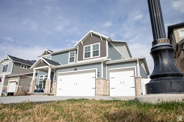 324 S Hayes Well Ln, Saratoga Springs, UT 84045 - view of front of house with stone siding and an attached garage