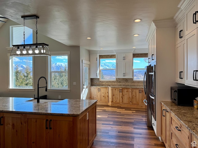 6007 W 8000 S, Payson, UT 84651 - kitchen featuring black microwave, white cabinets, a sink, and light stone countertops