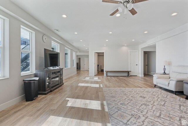 6007 W 8000 S, Payson, UT 84651 - living room featuring recessed lighting, visible vents, and light wood-style flooring