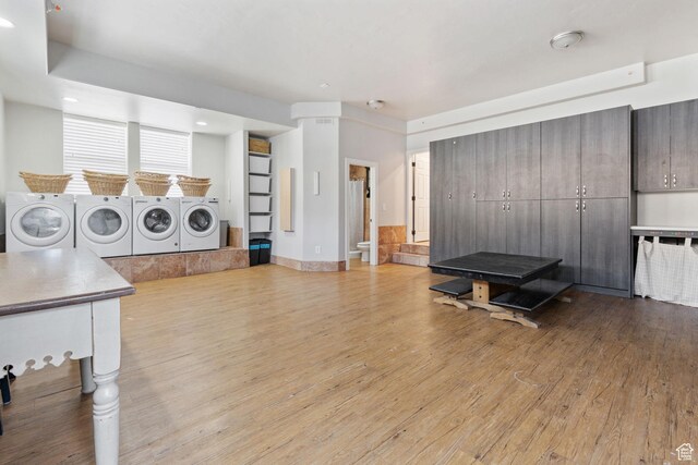 6007 W 8000 S, Payson, UT 84651 - workout room with light wood-type flooring, baseboards, and separate washer and dryer