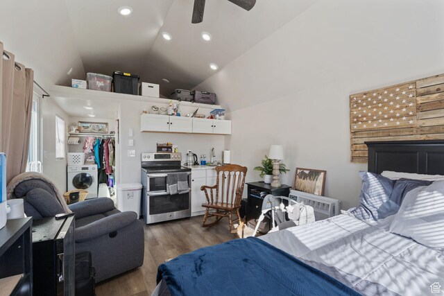 6007 W 8000 S, Payson, UT 84651 - bedroom with recessed lighting, a closet, vaulted ceiling, wood finished floors, and washer / dryer
