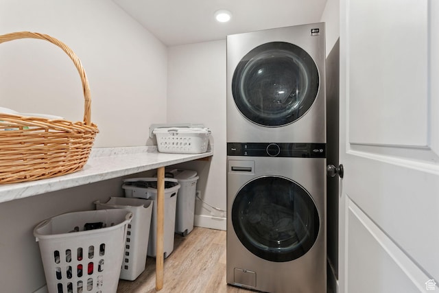 6007 W 8000 S, Payson, UT 84651 - laundry room with stacked washer and dryer, laundry area, light wood finished floors, and recessed lighting
