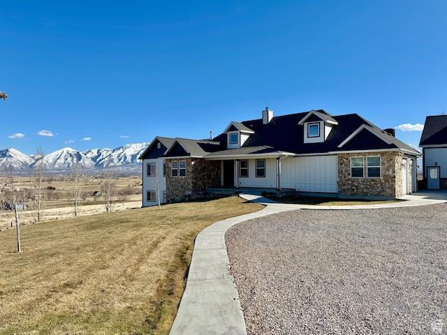 6007 W 8000 S, Payson, UT 84651 - view of front of house featuring a front lawn, a chimney, and a mountain view