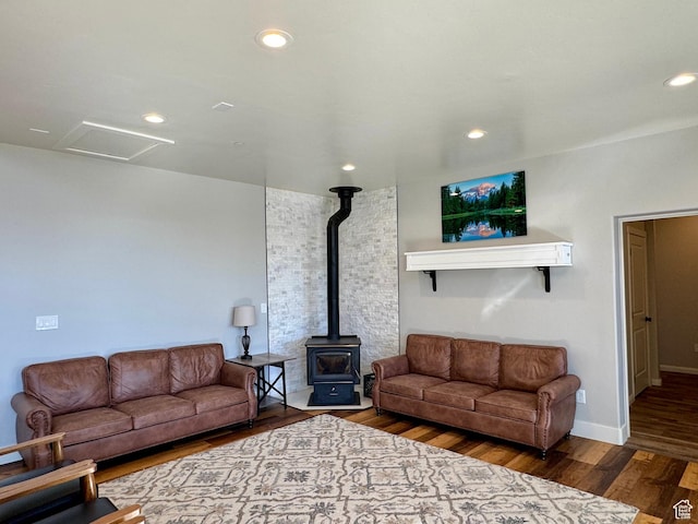 6007 W 8000 S, Payson, UT 84651 - living room featuring dark wood-type flooring, attic access, a wood stove, and recessed lighting