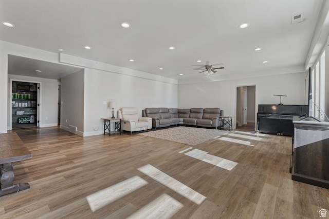 6007 W 8000 S, Payson, UT 84651 - unfurnished living room with light wood-style floors, recessed lighting, visible vents, and ceiling fan