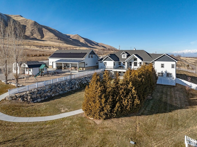 6007 W 8000 S, Payson, UT 84651 - exterior space with a residential view, a mountain view, fence, and a front yard