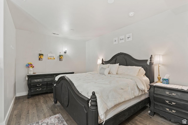 6007 W 8000 S, Payson, UT 84651 - bedroom with dark wood-style flooring, visible vents, and baseboards