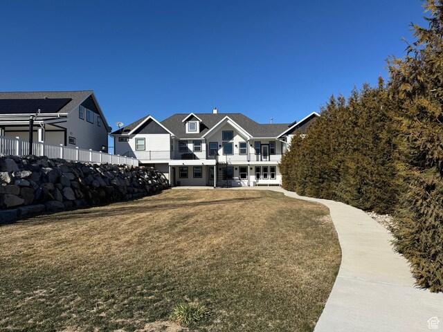 6007 W 8000 S, Payson, UT 84651 - rear view of property featuring a yard and fence