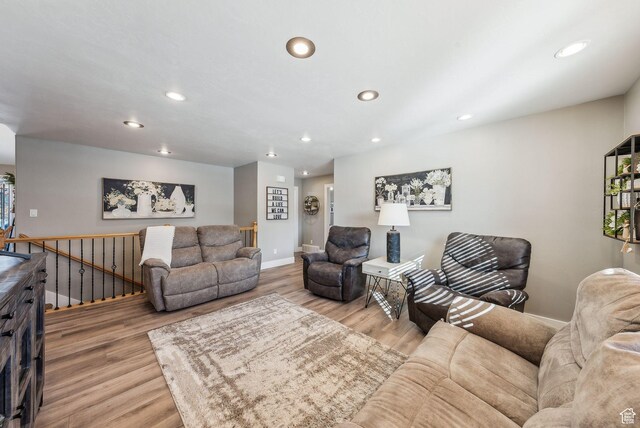 116 E Sandpiper Ln S, Saratoga Springs, UT 84045 - living room featuring recessed lighting, wood finished floors, and baseboards