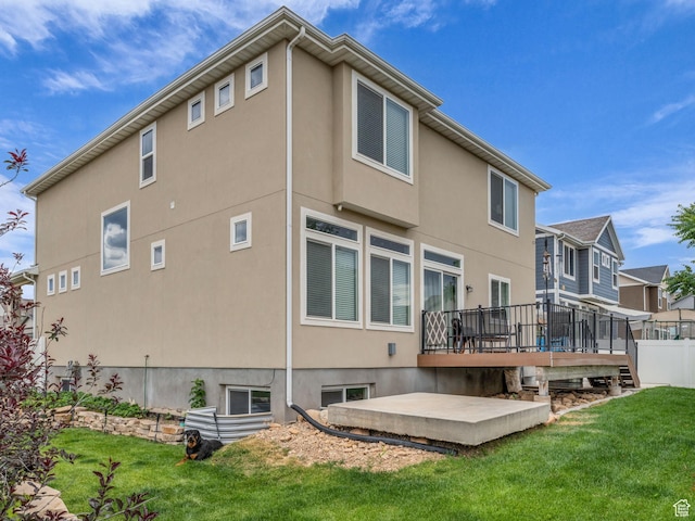 2144 S 120 E, Heber City, UT 84032 - back of property featuring a deck, a yard, and stucco siding