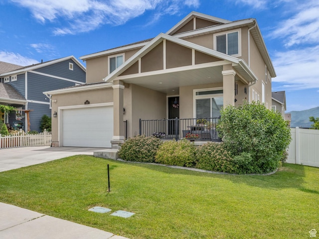 2144 S 120 E, Heber City, UT 84032 - view of front of house featuring stucco siding, concrete driveway, a porch, and an attached garage