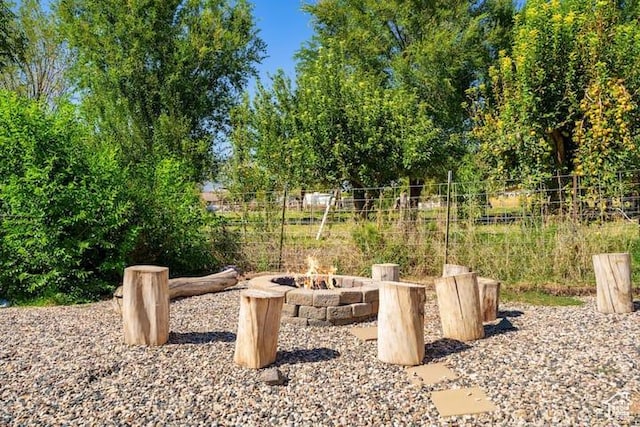 view of patio / terrace with a fire pit