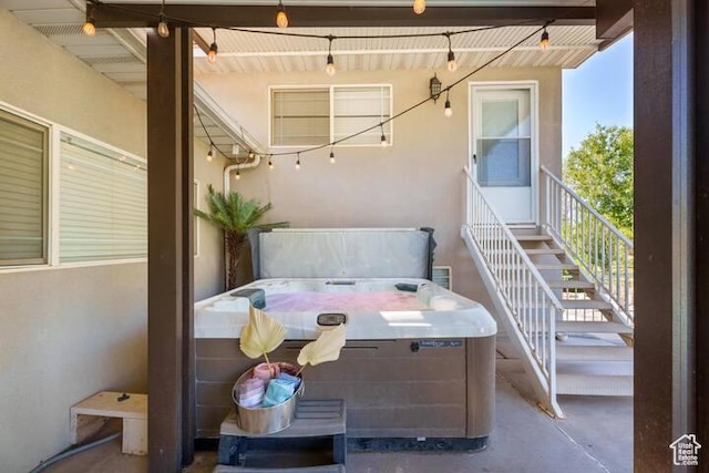 balcony featuring a hot tub