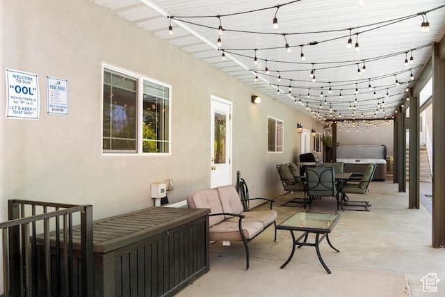 view of patio / terrace featuring a jacuzzi
